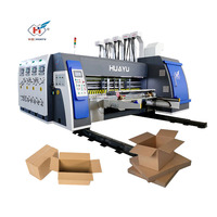 Machine d'impression flexographique, découpeuse, rainureuse et empileuse de cartons, impression 4 couleurs à l'encre aqueuse, machine de fabrication de boîtes en carton ondulé
