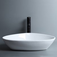 Pas cher Prix Triangle Forme Lavabo Moderne Design Blanc Sanitaire Comptoir En Céramique Lavabo Art Évier