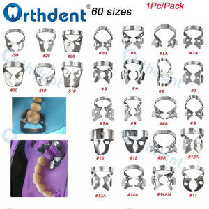 Pinzas <span class=keywords><strong>de</strong></span> dique <span class=keywords><strong>de</strong></span> goma dentales Orthdent <span class=keywords><strong>de</strong></span> acero inoxidable, clip <span class=keywords><strong>de</strong></span> barrera, instrumento para restauraciones endodónticas <span class=keywords><strong>y</strong></span> molares - Product Image 1