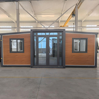 Maison conteneur modulaire préfabriquée extensible en panneaux sandwich d'acier, 2 chambres, moderne, bureau à domicile, logement secondaire spacieux et rapide à construire