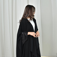 Abaya musulmane noire de luxe sur mesure en gros à Dubaï 2025 pour femmes, avec poignets à sequins, panneau à volants, robe modeste ouverte