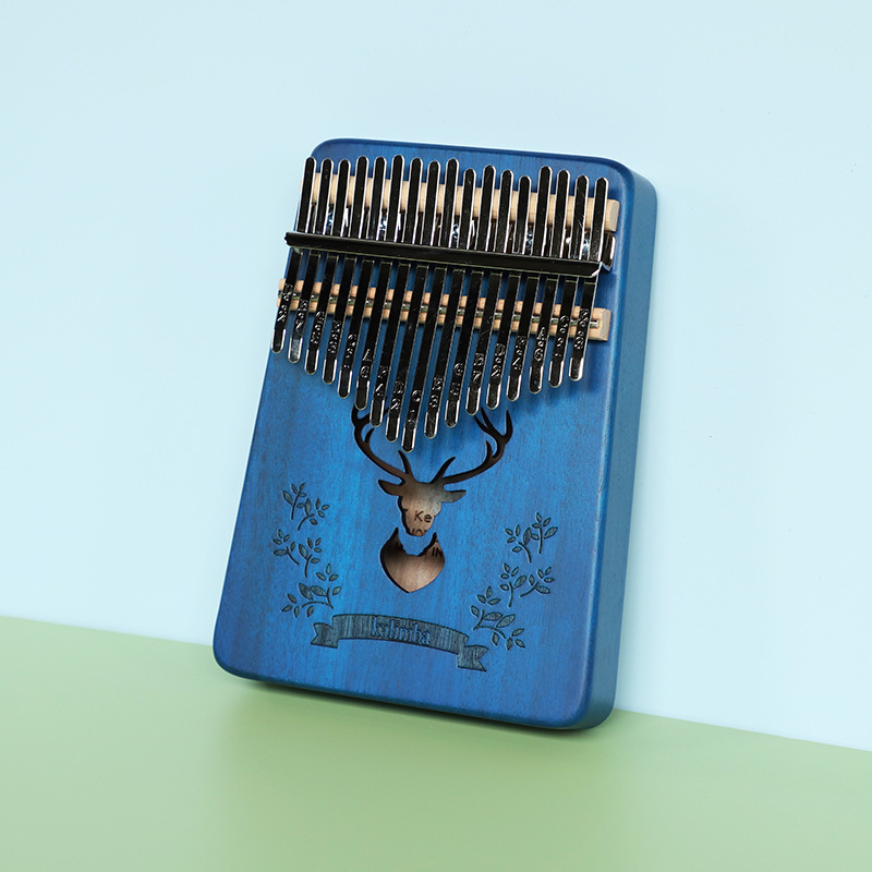 Sac cadeau marron avec pierres précieuses, motif cerf bleu forêt et cœur de fleur de pêcher.