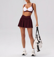 Ensemble deux pièces jupe de tennis et soutien-gorge de sport dos nu pour femme, personnalisable avec logo, idéal pour l'entraînement et la vente en gros