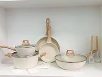 Peralatan Masak Batu Maifan Anti Lengket 17 Buah Set Desain Minimalis Modern Tutup Kaca Gagang Kayu untuk Perdagangan Luar Negeri yang Dapat Disesuaikan