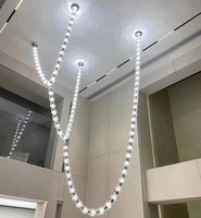 Lustre suspendu design nordique en forme de longues coupes à vin pour escalier, hôtel, villa, hall, allée, bar