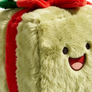 Boîte cadeau en peluche vert sauge avec visage souriant brodé, ruban rouge, jouet décoratif kawaii pour les fêtes - Product Image 2