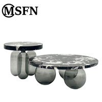 Table console moderne en marbre |   Table d'appoint de luxe avec plateau en marbre noir et base en forme de bouteille de verre pour salle à manger, villa, salon