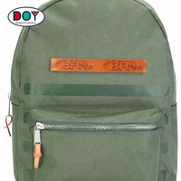 Vente en gros de design de mode personnalisé Logo de nom en relief Etiquette en cuir véritable pour sacs et jeans