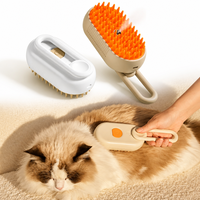 Brosse de toilettage et de massage à vapeur pour animaux de compagnie, outils de nettoyage et de bain, vente en gros d'usine