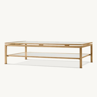 Table basse MARCEAU, choix entre un design carré ou ovale avec plateau en verre transparent et base en métal doré, luxe moderne pour le salon