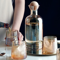 Bouteille d'eau en verre en forme d'échelle avec logo personnalisé Ensemble bouilloire en verre de bouteille de jus de fruits fantaisie en verre transparent