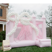 Château gonflable rose pastel de grande taille avec double toboggan, protection UV et imperméable, certifié CE