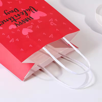 Op maat bedrukte Valentijnsdag hartvormige papieren cadeautas met handvat voor feestelijke cadeauverpakkingen