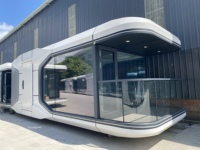 Maisons préfabriquées écologiques intelligentes de luxe Modernas Capsule d'espace mobile modulaire préfabriquée pour parcs et villas