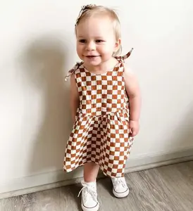 Vente en gros de robes été licou à carreaux pour bébés personnalisés pour enfants mignons robes gilet de princesse en coton pour bébés nouveau-nés