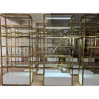 Étagère de présentation de vêtements pour boutique, présentoirs à vêtements dorés, étagères pour magasin de vêtements, présentoirs à vêtements en métal pour la vente au détail