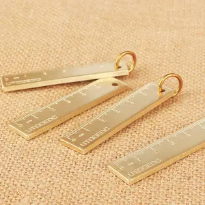 Promozionale laser personalizzata logo in ottone metallo oro righello per portachiavi