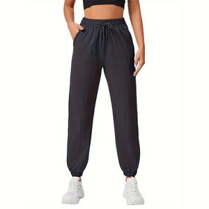 Pantalons de sport décontractés pour femmes grande taille OEM, taille élastique, amples, respirants, à séchage rapide, amincissants, pour la course à pied - Product Image 1