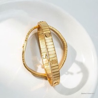 Bracelet unisexe en acier inoxydable avec moteur à vis et sangle élastique, idéal comme cadeau