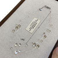 Collier pour femme fait main au design unique, chaîne de suspension inspirée de la rosée avec des perles de cristal transparentes, pendentif tendance