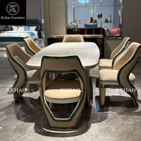 Ensemble de table à manger en marbre italien de luxe, chaises de salle à manger rembourrées design pour salle à manger de villa