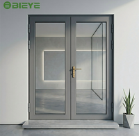 Puertas Dobles Modernas con Acabado ODM/OEM, con Vidrio, Construcción de Aluminio, Aislamiento Térmico para Uso Exterior