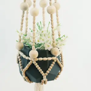 Perchas de plantas de poliéster hechas a mano de macramé para decoración del hogar y macetas negras colgantes de arte de pared de jardín