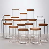 Offre Spéciale bocal de stockage en verre avec logo personnalisé bocal à épices en verre borosilicaté contenants pour le stockage des aliments bocal avec couvercle en bambou ensemble