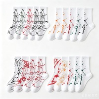 Chaussettes en coton jacquard OEM à imprimé graffiti abstrait et encre éclaboussée, style streetwear, unisexe, mode hip-hop, décontractées, cadeau