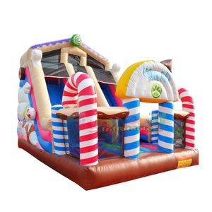 Tobogán inflable comercial de doble carril con castillo hinchable y zona de juegos, con diseño de dulces, para fiestas infantiles al aire libre. - Product Image 1