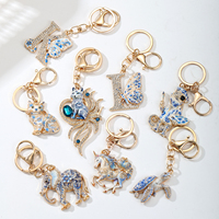 Porte-clés en gros XR en métal, breloques roses, fleurs, animaux, avec logo personnalisé, strass et épingles en émail