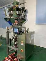 Machine de remplissage et d'emballage automatique de haute précision pour chips/noix
