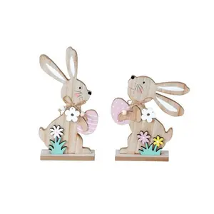 Wooden easter rabbit standing with egg for Easter decoration