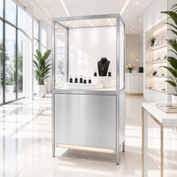 Vitrines à bijoux minimalistes de luxe, disponibles en couleurs personnalisées, idéales pour les centres commerciaux haut de gamme et les bijouteries.