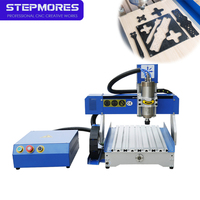 Petite machine de gravure CNC 3 axes 3040 avec rails carrés, commande DSP/RichAuto, broche de 1,5 kW pour la découpe de fibres de carbone