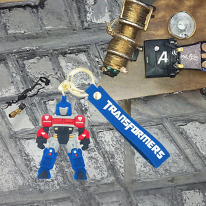 <span class=keywords><strong>Transformers</strong></span> mignons transfrontaliers <span class=keywords><strong>Optimus</strong></span> Prime Figurines 3D comme porte-clés de voiture, ornements suspendus, articles cadeaux. - Product Image 2