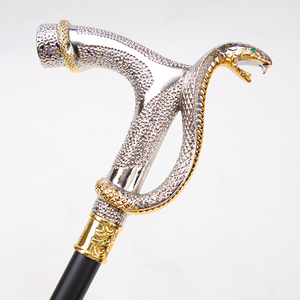 Canne décorative de luxe vintage pour gentleman, avec poignée en argent et or bicolore, yeux décoratifs verts et écailles fines. - Product Image 3