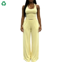 Ensemble de sport et de loisirs personnalisé : haut court à manches courtes taille haute effet push-up et pantalon long pour le yoga