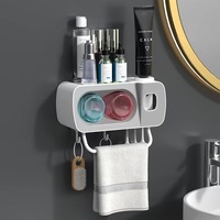 Porte-brosse à dents de salle de bain OEM perforation libre rince-bouche ventouse brossage mural avec distributeur de dentifrice