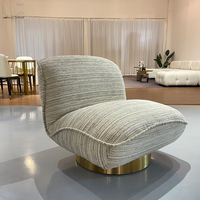 Fauteuil pivotant contemporain minimaliste rembourré de luxe avec base dorée, fauteuil d'appoint en bouclette pour salon