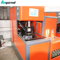 Machine de soufflage de bouteilles semi-automatique pour PET/eau minérale pour la production de contenants en plastique