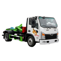Camion à ordures compacteur Howo 7cbm 4X2, boîte de vitesses manuelle, camion à ordures hydraulique à levage par crochet