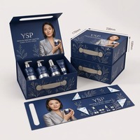 Boîte cadeau pliable bleue personnalisée de marque de luxe avec poignée, boîtes rigides en papier avec insert pour ensembles de soins de la peau de haute valeur