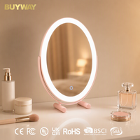 Miroir de maquillage ovale rose poudré avec anneau lumineux intégré et bras en U inclinable, miroir de vanité LED de table avec pieds cylindriques