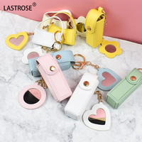 Porte-clés en cuir PU de luxe pour gloss, en forme de cœur, avec pochette pour huile à lèvres, accessoire de sac de voiture, pendentif pour femme, cadeau