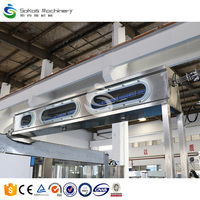 300ML 500ML 750ML Machine de moulage par soufflage de bouteilles en plastique automatique Ligne de production de remplissage d'eau minérale