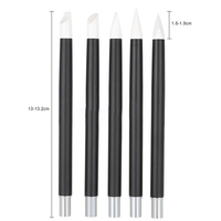 Stylo de gravure et de gaufrage pour nail art avec embout perforé, manche en acrylique, virole sertie et tête en silicone