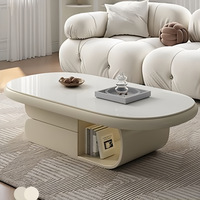 Grande table basse polyvalente de style crémeux à texture haut de gamme pour tout salon Rangement de forme ovale pour appartement de petite taille