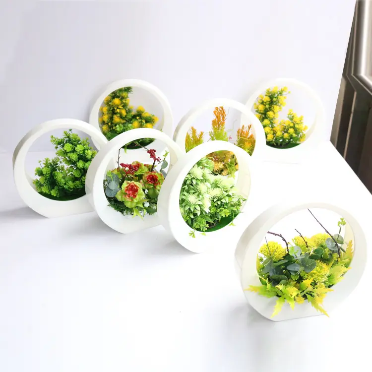 بسعر الجملة من المصنع نباتات اصطناعية صغيرة بونساي لتزيين طاولة جميلة خضراء مزيفة بوعاء