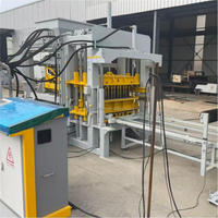 Machine de fabrication de blocs creux en béton entièrement automatique à haute efficacité QT4-15, moulage de briques en ciment haute précision